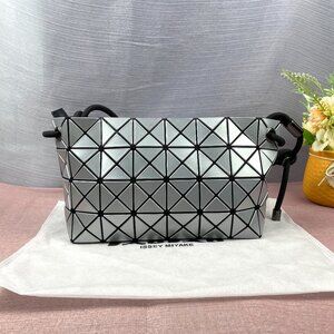 Brand new Issey Miyake silver knotted tofu sling bag.